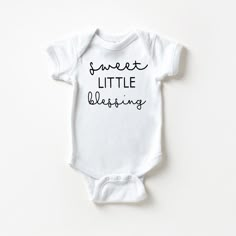 The perfect bodysuit for your perfect baby! These short sleeve bodysuits have 3 snap closure and double needle ribbed binding on neck, shoulders, sleeves, and leg openings. Machine wash cold, inside out. Air dry or tumble dry low. Bible Verse Baby Onesie, Baby Onsie Decorating Idea, Cute Onesie Sayings, Baby Onesie Cricut Ideas, Onesie Gift Ideas, Cute Baby Onesies Sayings, Personalized Onesie Boy, Baby Shirt Ideas, Cricut Onesie Ideas