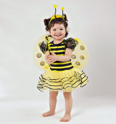 Brighten up any event with this adorable 4-piece Bee Costume for girls! This set includes a striped dress, wings, a bee stick, and a cute hairband with antennae, perfect for Halloween, themed birthday parties, or fun dress-up play. Made with comfortable, high-quality materials, this costume ensures your little one will buzz with joy all day long. The vibrant yellow and black design will make your child stand out, capturing everyone’s attention at any event! Bee Kids Costume, Baby Bumble Bee Costume, Bee Fancy Dress, Bee Antenna, Bee Costumes, Honey Bee Birthday, Bumblebee Costume, Baby Bumble Bee, Bumble Bee Costume