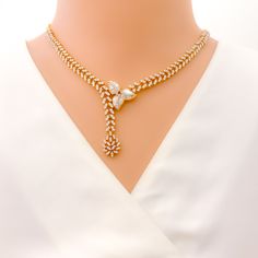 This exquisite 18k gold necklace set, weighing 50.2 grams, features an exclusive asymmetrical leaf design adorned with dazzling diamonds. The yellow gold finish enhances its luxurious appeal, making it perfect for any special occasion. The set includes a necklace with a total diamond weight of 6.97 carats, featuring F-G color and VS quality diamonds in round and baguette shapes. The necklace has a length of 17 inches with a 2-inch drop length, adjustable 1-inch links, and a secure hook lock. The Elegant Gold Plated Bridal Necklace For Formal Occasions, Elegant Gold Plated Diamond Necklace, Luxury Gold Bridal Necklace With Diamond Accents, Formal Gold Bridal Necklace With Single Cut Diamonds, Gold Diamond Bridal Necklace For Formal Occasions, Elegant Yellow Gold Bridal Necklace With Single Cut Diamonds, Formal Gold Diamond Bridal Necklace, Elegant Yellow Gold Diamond Bridal Necklace, Elegant Hand Set Gold Diamond Necklace