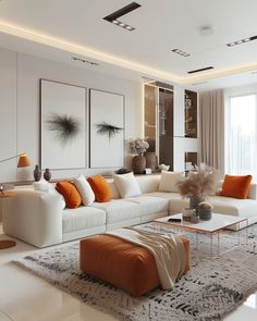 a living room filled with white couches and orange pillows on top of a rug