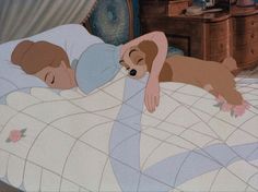 an animated image of a woman sleeping in bed with a dog laying on her back