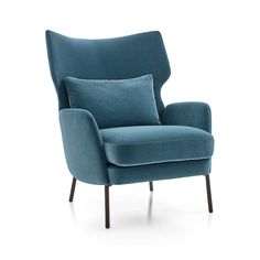 a blue chair with two pillows on the back and one arm upholstered to it