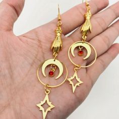 Beautiful Gypsy Hands Gold Light Metal Dangling Earrings With Red Beads New Star Drop Earrings, Red Beads, Gold Light, Dangling Earrings, Moon Earrings, Red Bead, Pierced Ears, Red Gold, Lady In Red