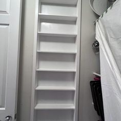 the closet is empty and ready for us to use it as a storage area in the bathroom