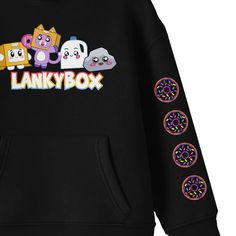 Embrace the Lanky Box universe with this youth black long sleeve hooded sweatshirt, showcasing Boxy, Foxy, Ghosty, and Rocky. Circle icons dance along the left sleeve, while vibrant rainbow text adorns the right sleeve, adding a burst of color to the design. Made from a blend of cotton and polyester, this sweatshirt guarantees comfort and style. Easy maintenance is assured with machine washing on cold and tumble drying on low heat. The double-lined hood enhances warmth and style, making it an of Trending Graphic Tees, Black Hooded Sweatshirt, Bow Shorts, Minnie Mouse Girl, Top Graphic Tees, Kids Outfits Girls, Cute Characters, Tee Shop, Fleece Hoodie