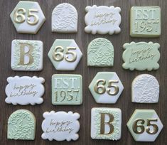 decorated cookies are arranged in the shape of letters and numbers