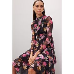 Black floral chiffon (95% Polyester, 5% Elastane). A-line. Long sleeves. Mock neck. Pull on. 46" from shoulder to hemline. Imported. Black Floral Print Chiffon Dress For Spring, Spring Black Chiffon Dress With Floral Print, Formal Long Sleeve Chiffon Dress With Floral Print, Long Sleeve Floral Print Chiffon Evening Dress, Evening Long Sleeve Floral Print Chiffon Dress, Long Sleeve Floral Chiffon Evening Dress, Chic Black Chiffon Dress With Floral Print, Elegant Floral Print Chiffon Dress For Fall, Chic Evening Chiffon Dress With Floral Print