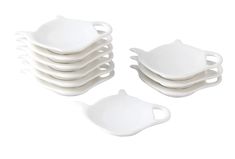 a stack of white dishes sitting on top of each other