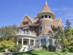 an old victorian style house with a turret