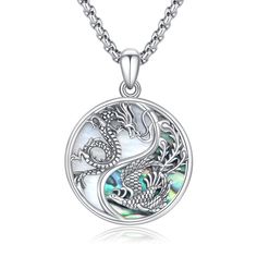 PRICES MAY VARY. 【Dragon Phoenix Yinyang Necklace Design】Both dragon symbols of power, nobility, might and luck,the dragon amulet necklace has a beautiful meaning of bringing protection, wealth and good luck. It is a classy and masculine chinese dragon necklace for men. The yin yang symbol represents harmony and balance. The combination of the dragon and yin yang in this necklace design creates a powerful and meaningful symbol. 【S925 Sterling Silver Yin Yang Necklace】 The silver dragon Yin Yang Dragon Design Jewelry Gift, Dragon Design Jewelry For Gift, Round Dragon Design Jewelry For Gifts, Round Dragon Design Necklace For Gift, Sterling Silver Necklace With Dragon Design, Dragon Design Round Pendant Necklace As A Gift, Silver Dragon Design Jewelry Gift, Dragon Design Round Pendant Necklace For Gift, Spiritual Sterling Silver Necklace With Dragon Design