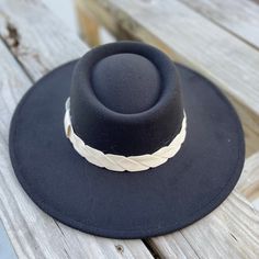 These wide brim hat exudes rustic sophistication to carry out western cowgirl looks woven with hints of chic bohemian style. The felted fedora hat is equal parts comfortable and fashionable. size adjustable 90% polyester, 5% cotton, 5% wool height: 4 ½” circumference: 24” brim width: 3 ½” Western Fedora With Braided Flat Brim, Western Braided Fedora Hats, Braided Western Fedora Hats, Adjustable Fedora For Fall Rodeo, Western Style Wide Brim Boater Hat For Fall, Adjustable Fall Fedora For Rodeo, Adjustable Fedora For Rodeo In Fall, Western Style Short Brim Boater Hat For Fall, Western Style Boater Hat With Short Brim For Fall