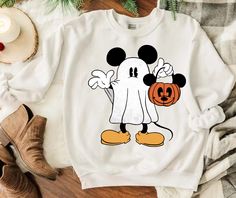 Disney Halloween Mickey Mouse Boo Sweatshirt Mickey Mouse Halloween Shirts, Disney Spooky Outfits, Casual Mickey Mouse T-shirt For Fall, White Disney Sweatshirt For Fall, Fall Mickey Mouse Crew Neck T-shirt, Disney White Sweatshirt With Cartoon Print, Disney White Cartoon Print Sweatshirt, White Disney Character Print Sweatshirt For Fan Events, White Disney Cartoon Print Sweatshirt