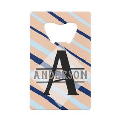 a bottle opener with the word anderson on it's front and back cover in blue,