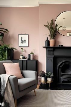 a living room filled with furniture and a fire place in front of a pink wall