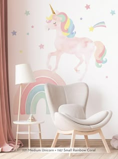 a child's room with pink walls and unicorn wall decals