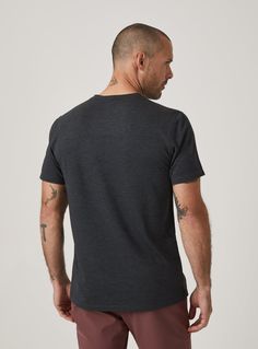 The Core™ Tee will be your most functional and sustainable tee, doubling as your new go-to t-shirt. With premium fabric and comfort, this performance shirt has 4-way stretch, moisture wicking and quick dry abilities made with up-cycled fabric. Details Model is 6'1" and wears a size medium. Care: Machine wash cold on delicate cycle, low tumble dry, do not iron Composition: 94% Polyester | 6% Spandex Technical Gray Crew Neck T-shirt, Gray Technical Crew Neck T-shirt, Functional Gray T-shirt With Go-dry Technology, Functional Gray Go-dry T-shirt, Technical Midweight Crew Neck Top, Midweight Technical Crew Neck Top, Black Crew Neck Top In Recycled Polyester, Quick Dry, White Undershirt