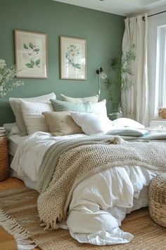 a bedroom with green walls and white bedding, wicker baskets on the floor