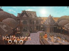 an animated halloween village with pumpkins on the ground