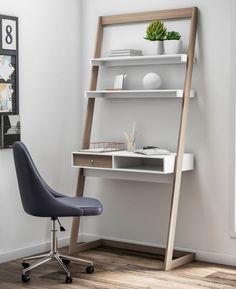 an office with a ladder leaning up against the wall next to a desk and chair