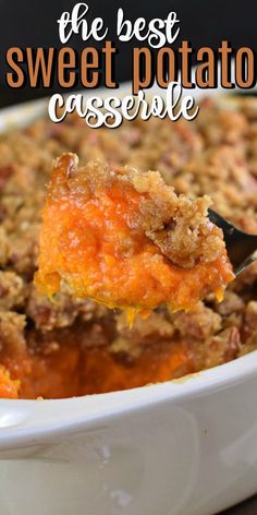 the best sweet potato casserole is in a white dish with a black serving spoon