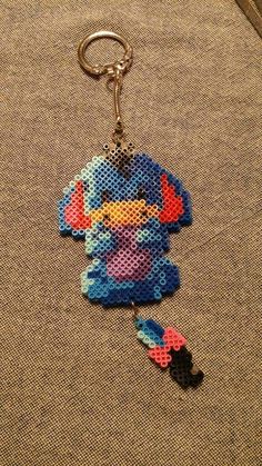 the stitching keychain has been made to look like cartoon characters