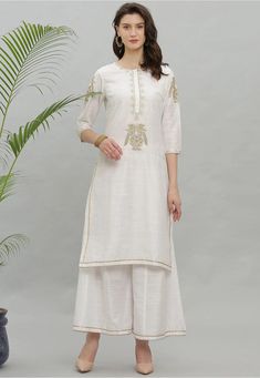 Art Dupion Silk Straight Kurta in White This Readymade attire is Enhanced with Resham and Zari Work and is Crafted in Round Neck and Quarter Sleeve Available with an Art Dupion Silk Palazzo in White Do note: Accessories shown in the image are for presentation purposes only and length may vary upto 2 inches.(Slight variation in actual color vs. image is possible). White Traditional Embroidered Dress With Zari Work, Traditional White Embroidered Dress With Zari Work, White Embroidered Zari Work Dress, Spring Chanderi Kurta With Embroidery, White Embroidered Straight Kurta Set, White Embroidered Dress For Navratri, White Embroidered Dress With Traditional Drape, White Sharara With Embroidered Border And Straight Kurta, White Palazzo Set With Embroidered Border And Straight Kurta