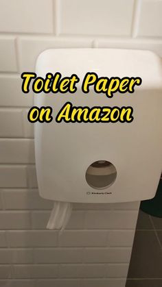 a white toilet paper dispenser with the words toilet paper on amazon above it