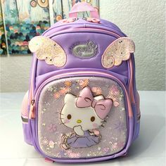 Hello Kitty Backpack, Perfect School Bag For Students. Size: 35cm/ 17in Length X 26cm/ 13in Wide. Cute Purple Backpack For Students, Purple Backpack For End Of School Year, Purple Standard Backpack For End Of School Year, Cute Purple Standard Backpack, Cute Standard Purple Backpack, Cute Purple Backpack, Accessories Hello Kitty, Hello Kitty Backpack, Kitty Backpack