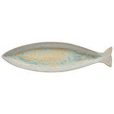 a fish shaped dish is shown on a white background with blue and gold glaze