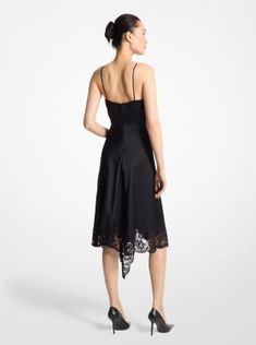 Part of our Fall/Winter 2024 Runway lineup, this asymmetric dress features a languid silhouette cut from Italian-made silk charmeuse. A silk-lined floral lace bodice evokes a lingerie feel and echoes the lace-trimmed hem. Add a slim belt and streamlined pumps for a sophisticated evening look. Elegant Lace Bias Cut Dresses, Luxury Satin Dress With Lace Trim, Formal Lace Dress With Bias Cut, Silk Slip Dress With Lace Bodice For Evening, Evening Midi Dress With Lace Bodice, Elegant Silk Dress With Lace Bodice, Chic Satin Dress With Lace Bodice, Silk Cocktail Dress With Lace Trim, Sleeveless Silk Dress With Lace Bodice