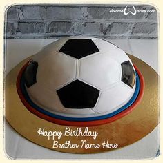 a birthday cake with a soccer ball on top and name written on the bottom layer