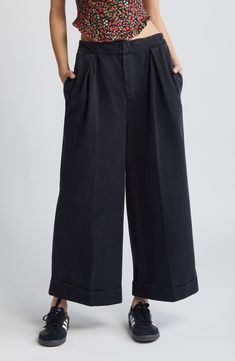 Casual-cool style is easy in these relaxed wide-leg pants featuring a comfy elasticized waist and rolled cuffs for polished detail. 24 1/2" inseam; 26" leg opening; 14" front rise; 17" back rise (size Medium) Zip fly with hook-and-bar closure Front slant pockets; back patch pocket 100% cotton Machine wash, tumble dry Imported Pants Nordstrom, Gaucho Pants, Fabric Gifts, Free Fabric, Black Fits, Leg Pants, Patch Pocket, Black Pants, Wide Leg Pants