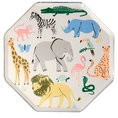 a paper plate with animals and giraffes on it