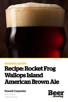 a beer glass sitting on top of a table next to a sign that says recipe rocket frog walops island american brown ale