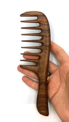 "Handmade Premium Quality Whole Piece Natural Wood Hair Comb With Handle Long Hair Comb Natural Wood Anti Static Comb Wood Comb Women Gift Idea Hair Combs Beautiful handmade comb made of North America walnut. Made from a whole piece, BUT with glued in \"guarding\" ( \"insertion\" of a wood with grains vertical to comb, so that \"insertion\" \"holds\" comb), this protects from deformation in case of inappropriate usage (wet - hot - dry) and from breaking. Every tooth is perfectly polished, gently Comb For Curly Hair, Pick Comb, Handmade Comb, Wood Comb, Wooden Comb, Gourds Crafts, Wide Tooth Comb, Scroll Saw Patterns, Wood Carving Art