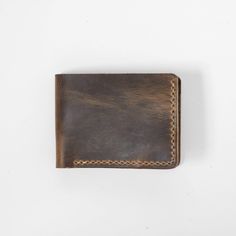 Crazy Horse Billfold- leather billfold wallet - mens leather bifold wallet - KMM & Co. Distressed Brown Leather Wallet, Hand-stitched Leather Trifold Wallet, Classic Handmade Leather Wallet, Handmade Classic Leather Wallet, Classic Handmade Leather Trifold Wallet, Classic Leather Trifold Wallet Hand-stitched, Rugged Leather Wallet With Coin Pocket, Rugged Leather Bifold Wallet, Rugged Bifold Wallet For Everyday Use