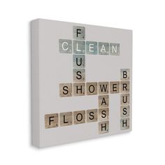 a cross made out of scrabble tiles with the words clean, sup, shower, floss, flesh