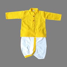 This traditional Indian Beautiful Cotton Katha Work Kurta Pajama Dhoti  Lemon Yellow & White Dress For New Born Kids Infant Traditional Ethnic Wear.  will surely add charm to your cute boy. SALES PACKAGE- 1 Cotton Kurta, 1 Dhoti ( Pant ) Or Pajama ( Pant ) FABRIC-   100 % Cotton Cloth  OTHER DETAILS- This Product Is Good For Your Baby Skin                                    Best Quality And Quick Dispatch                                    It has a soft elastic belt for convenient fitting on the waist. Delivery time ranges between 11 - 18 working days, we provide a Express Shipping Also 5-7 days with Extra charge, You may choose in shipping Option. * You May Conversation With Me if You have any doubt. Thank you so much to visit my shop. Rajesh Bansal owner of Rajasthani Dresses Fitted Cotton Churidar For Puja, Fitted Cotton Salwar Kameez For Puja, Traditional Long Sleeve Sets For Summer, Traditional Long Sleeve Summer Sets, Long Sleeve Cotton Churidar For Puja, Traditional Summer Kurta For Ceremonies, Fitted Cotton Kurta With Traditional Drape, Fitted Straight Kurta Sets For Puja, Cotton Sets With Pallu And Long Sleeves