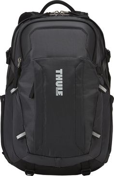 a black backpack with the word thule on it's front and side pockets