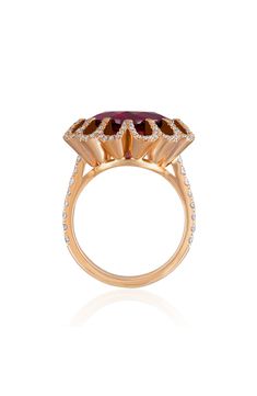 Diamond-encrusted prongs showcase the vibrant garnet stone that seems to float in the center of this striking ring. Total garnet weight: 8ct.   Total diamond weight: 0.7ct.   Color: G–H   Clarity: VS   18k gold/garnet/diamond   Made in the USA   >Diamond Guide Garnet And Diamond Ring, Alexis Bittar Jewelry, Diamond Guide, Garnet Stone, Jewelry Photography, Alexis Bittar, Jewelry Business, G H, 18k Rose Gold