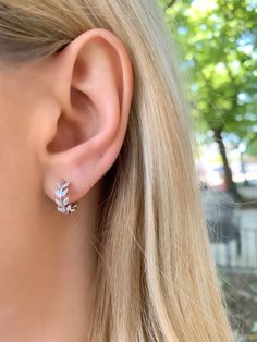 Rooted in nature these Sterling Silver Vine Huggie Hoops add a boho vibe to any outfit. #earrings #huggies #hoopearring #huggiehoop #bohochic #boho #hoop #jewelry #silverearring #silverhoop #giftguide #shopstyle #shopthelook #everyday #workfromhome Diamond Hoops Earrings, Earrings Huggies, Hoop Jewelry, Long Silver Earrings, Hoops Earrings, Boho Designs, Diamond Hoop Earrings, Classic Jewelry, Huggie Hoop Earrings