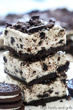 three cookies and oreo ice cream sandwiches stacked on top of each other