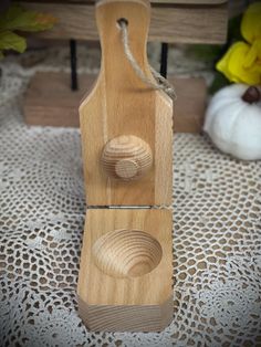 two wooden objects sitting on top of a table