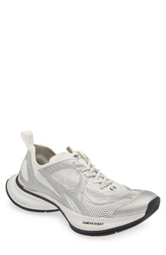 Balenciaga's exaggerated proportions define a track-style sneaker designed with a springy, bulbous heel and a raised, rubberized logo at the back. Lace-up style Textile and synthetic upper and lining/rubber sole Imported Designer Shoes Gore-tex Sneakers For Sports With Laces, White Gore-tex Casual Sneakers, White Casual Gore-tex Sneakers, Luxury Functional Gore-tex Sneakers, Balenciaga Track.2 Open Sneakers, Designer Sneakers, White Silver, Up Styles, Designer Shoes