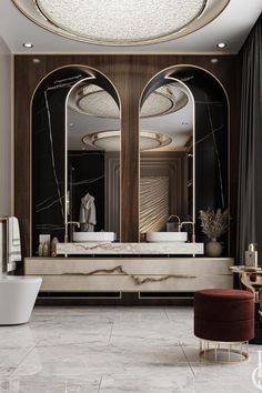 a large bathroom with two sinks and mirrors