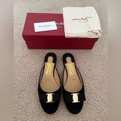 New With Box And Dust Bag, Salvatore Ferragamo Black 'Emile' Bow Suede Mules Slide Flats Size 6.5c, Black 'Emile' Mules From Salvatore Ferragamo. Made Of Suede. Grosgrain Bow With Gold-Tone Metal Insert With Embossed Logo On The Front. Beige Leather Sole. Elegant Closed Toe Flats With Red Sole, Formal Flats With Suede Lining And Almond Toe, Elegant Flats With Red Sole, Formal Almond Toe Flats With Suede Lining, Elegant Almond Toe Flats With Suede Lining, Elegant Black Slip-on Flats, Luxury Calf Leather Flats With Closed Toe, Luxury Closed Toe Calf Leather Flats, Luxury Calf Leather Closed Toe Flats