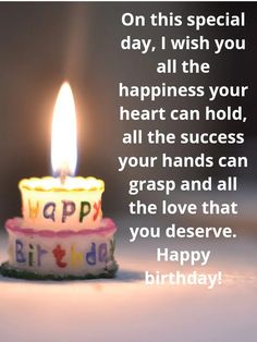 a birthday cake with a lit candle on it that says, on this special day i wish you all the happiness your heart can hold