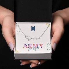 "This adorable custom necklace features a contemporary font that is sure to become a favorite accessory! From a heart-warming holiday present, special occasion gift, or just because, this unique necklace adds a trendy touch to any outfit for any BTS Army! Your necklace will be custom made upon ordering in the name or word of your choice, with up to 10 characters. It's a gift that anyone will surely want to keep close to their heart! Product specifications: - Customized with up to 10 characters - Custom Name Kpop Jewelry For Friendship, Jhope Necklace, Bts Moon Necklace, Kpop Jewelry, Jimin Army Necklace, Bts Earrings, Bts Bracelet, Bts Style, Bts Merch Sweatshirts & Hoodies