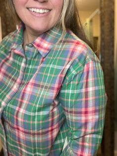 Get ready to spring into style with our Green Spring Plaid Button Down Top! This versatile top features a trendy plaid pattern, perfect for any occasion. Whether you're dressing up or keeping it casual, this top will add a pop of color to your wardrobe. (Fashion-forward and fun, this top is a must-have for any fashionista's closet. Keep it stylish and playful with our Green Spring Plaid Button Down Top!) Jess is a L/XL, 12/14 and is wearing a L here. Spring Everyday Plaid Shirt, Green Flannel Shirt For Workwear And Fall, Relaxed Fit Flannel Shirt With Button Closure For Spring, Plaid Tops With Button Closure For Fall, Spring Relaxed Fit Flannel Shirt With Button Closure, Spring Flannel Shirt With Relaxed Fit, Classic Plaid Tops For Casual Gatherings, Plaid Long Sleeve Tops For Casual Gatherings, Plaid Button Closure Workwear Top