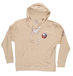 The Coastal Collection The perfect all year hoodie for New York Islanders fans. This oatmeal color hoodie is an officially licensed product of the NHL. This sweater is a mid-weight design, providing the perfect level of comfort for yearlong wear. Made from 60% cotton/40% polyester Hockey lace feature Kangaroo pouch Embroidered Islanders chest crest Athleisure Hoodie For Fan Gear, Fan Merchandise Drawstring Hood Top, Fan Merchandise Hooded Top With Drawstring Hood, Casual Tops With Drawstring Hood For Fans, Fan Apparel Sweatshirt With Drawstring Hood, Fan Gear Hooded Sweatshirt With Drawstring, Sporty Tops With Drawstring Hood For Fan Merchandise, Fall Fan Apparel Sweatshirt With Drawstring Hood, Sporty Hooded Fan Merchandise Hoodie